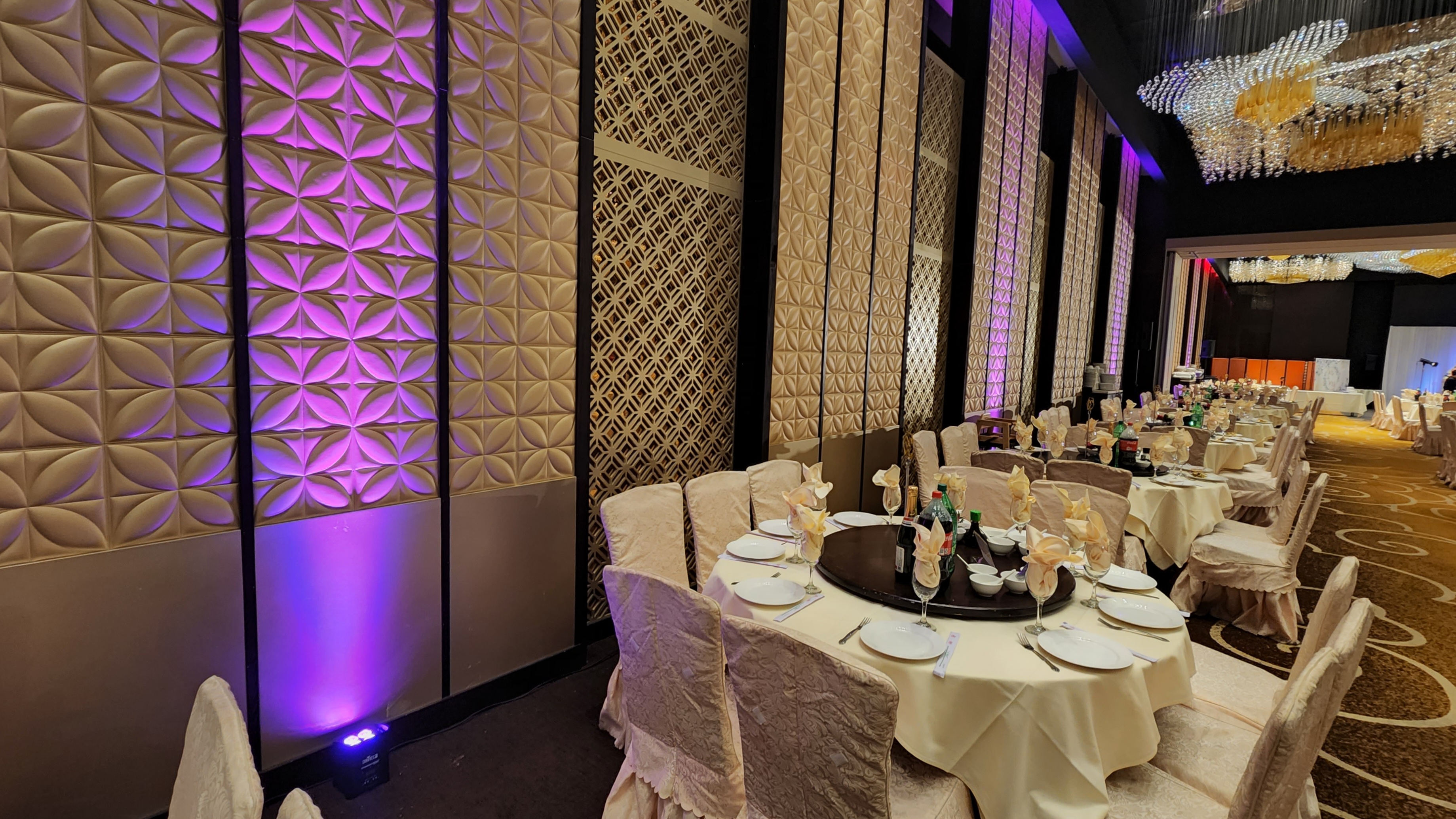 Colorful event lighting filling a celebration space